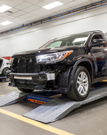 Toyota on vehicle lift | Toyota of Laramie in Laramie WY